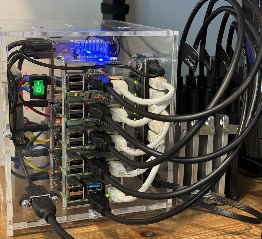 5 raspberry pis each with a SSD over USB, stacked in a custom case with a network switch