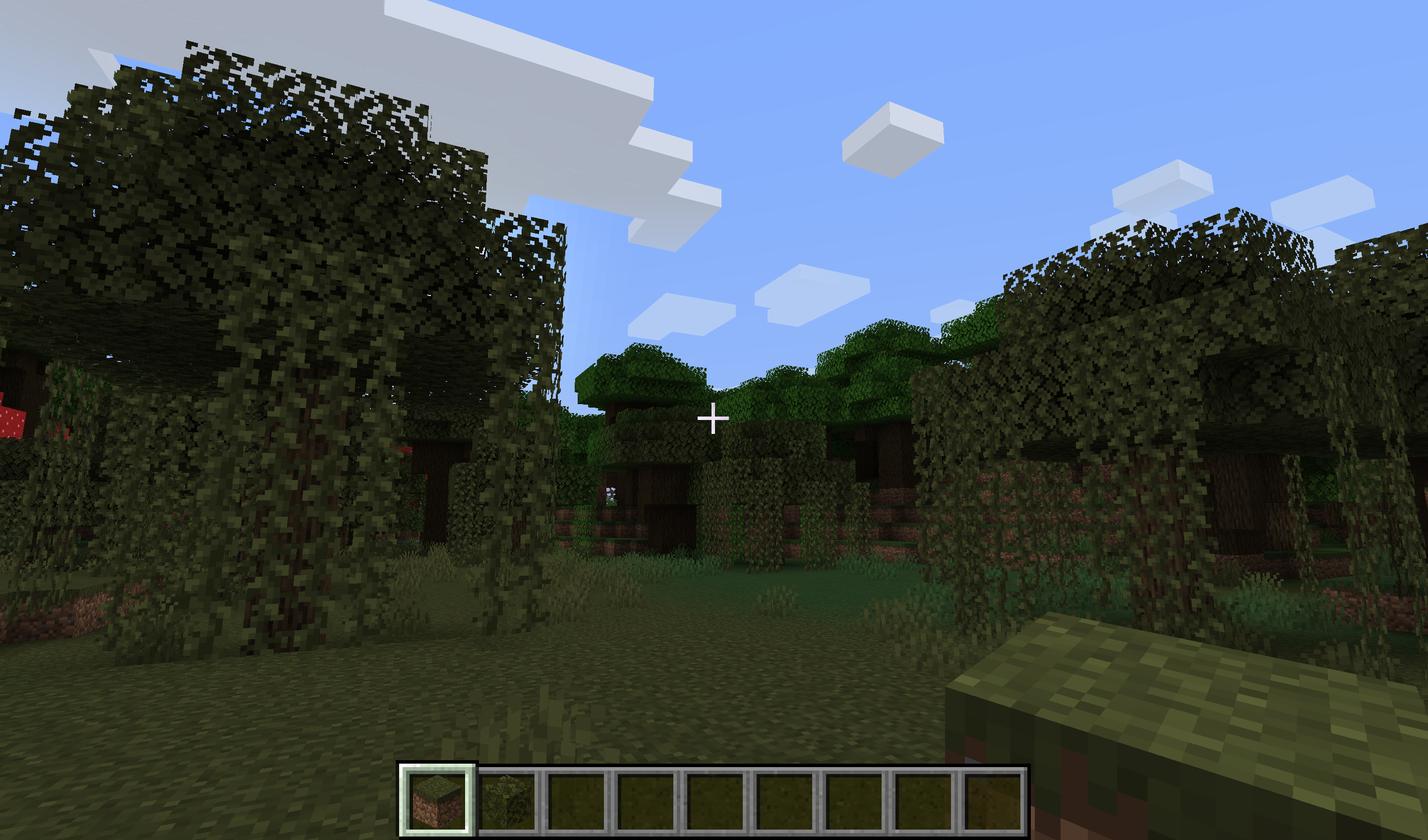 A grass block item in a swamp biome