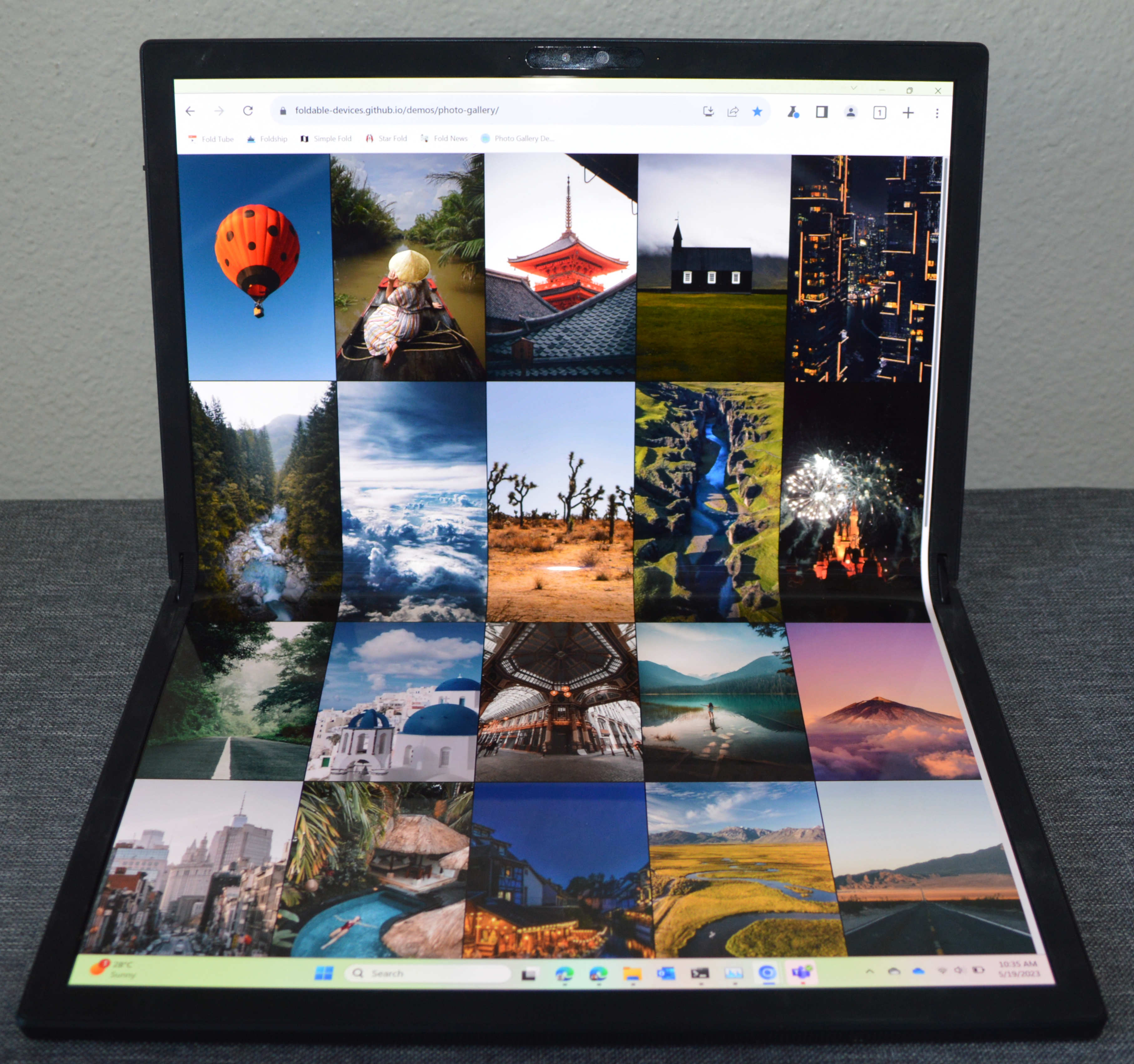 picture of a Asus Zenbook Fold running the photo gallery demo