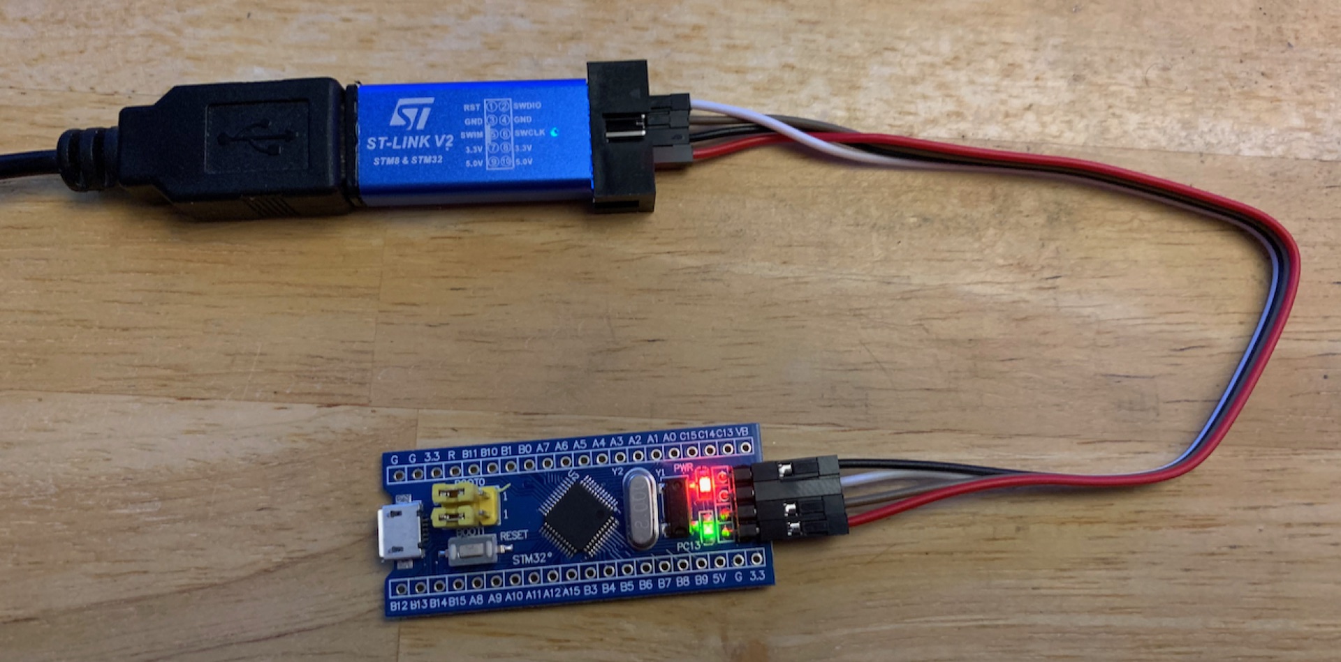 stlink with stm32 blue pill connected to it