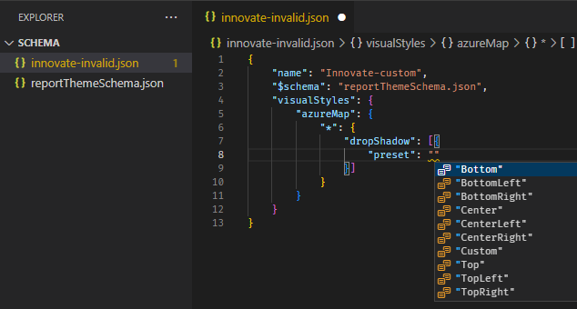 Specifying a "$schema" top-level property in a JSON file, referencing a local reporThemeSchema.json file